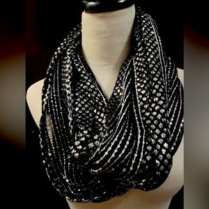 Black and silver metallic shiney circle scarf.